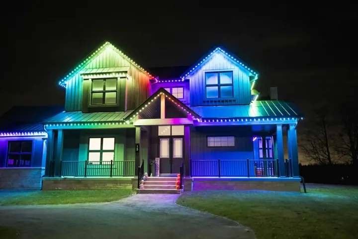 A GTA home with permanent roofline lighting in rainbow colours