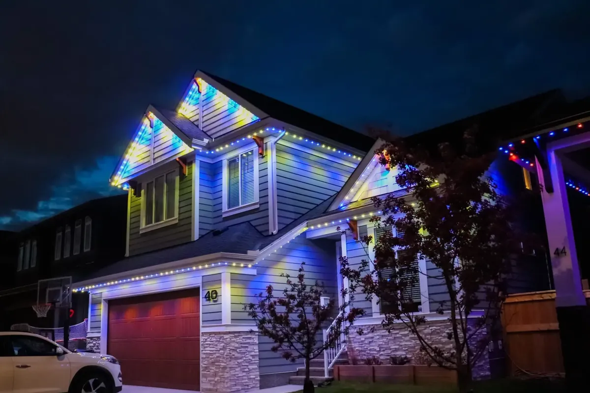 Multicolour permanent lighting on a two-storey home