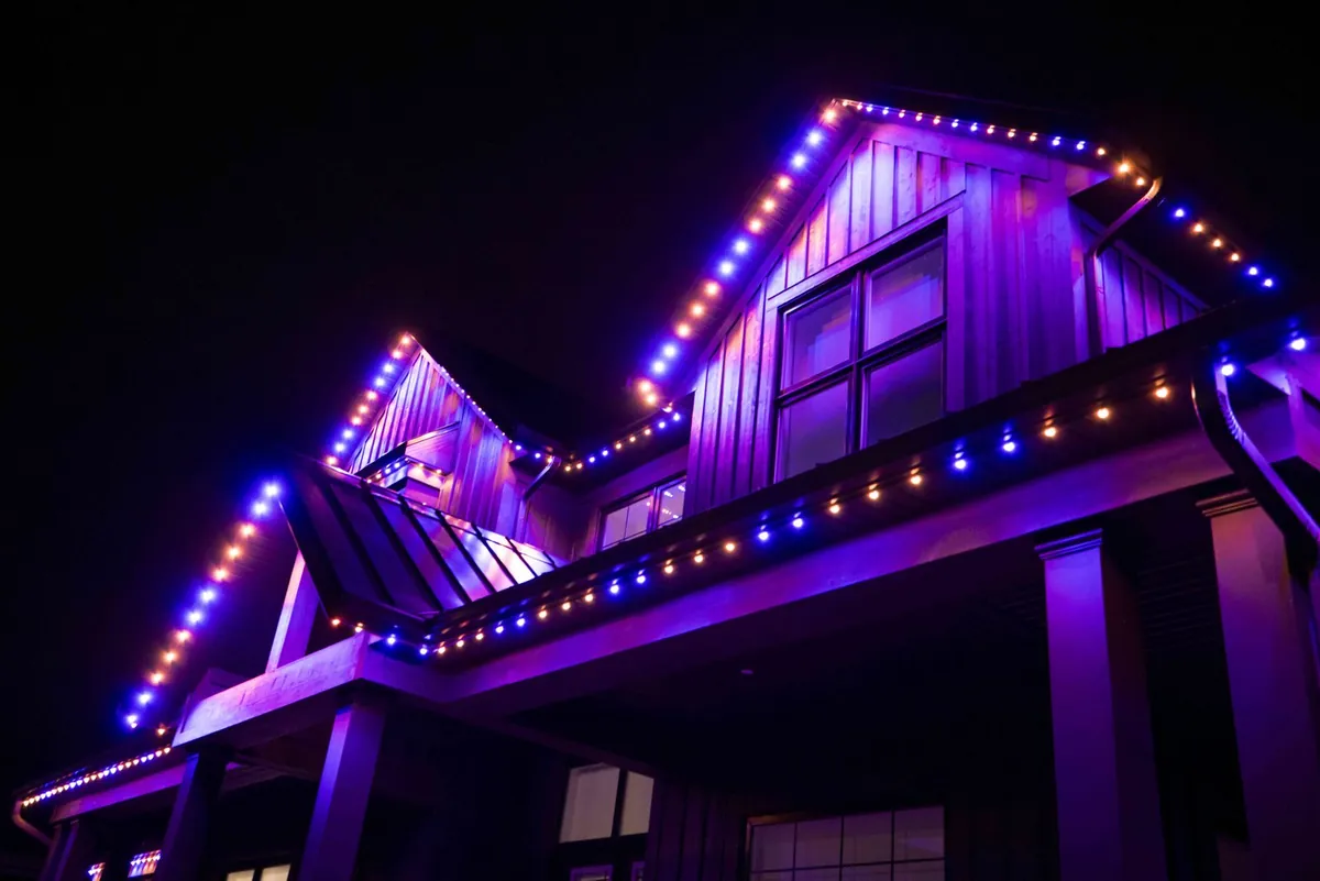 Close-up of the aluminum track with purple LEDs